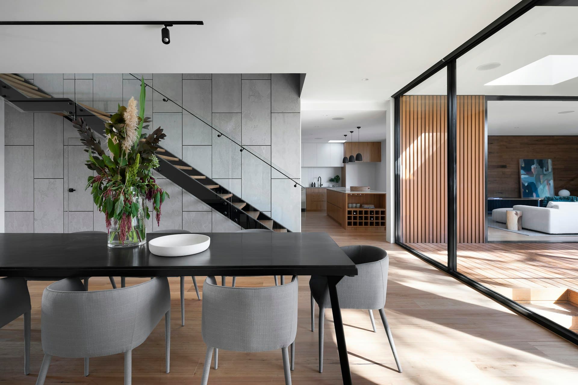 Warm architectural spaces opening toward natural light